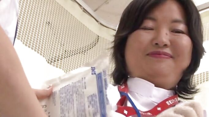 Japanese Nurse Comforts Her Patient