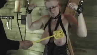 Old Woman With Big Boobs Is Getting Chained To An X Cross Old Woman With Big Boobs Is Getting Chained To An X Cross