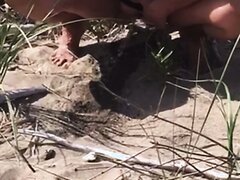 Shaved MILF Pees At The Beach Shaved MILF Pees At The Beach